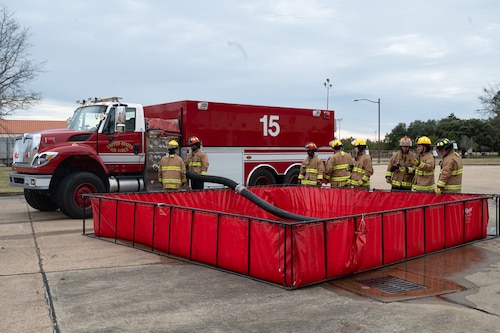 42d Civil Engineering Squadron firefighters, work together during training at Maxwell Air Force Base, Alabama, Jan. 22, 2026.