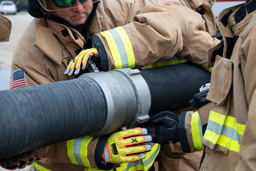 A 42d Civil Engineering Squadron firefighter, adjusts his equipment during training at Maxwell Air Force Base, Alabama, Jan 22, 2026.