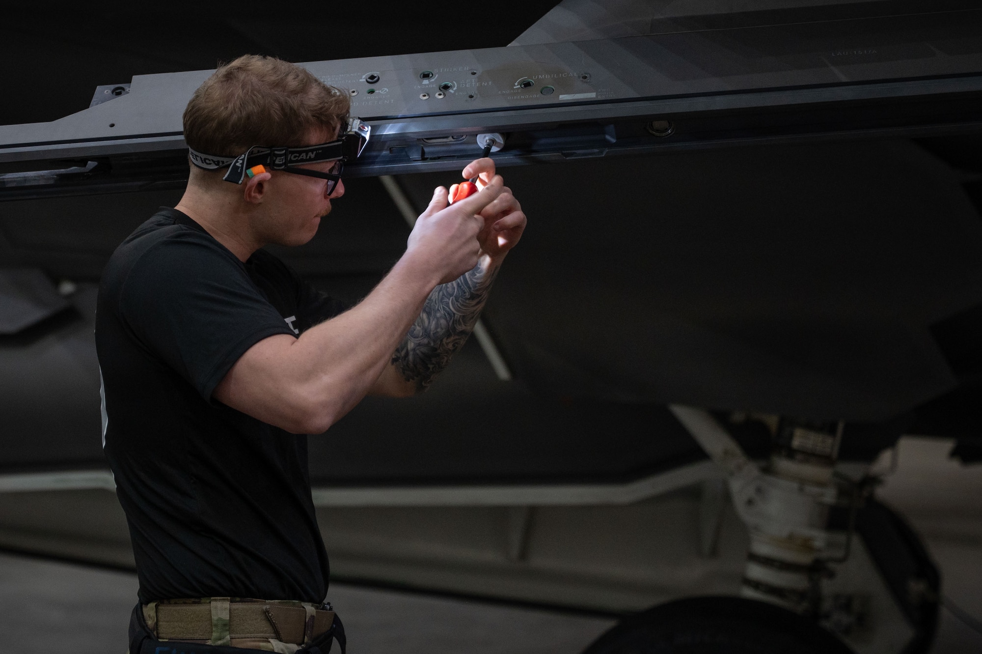 U.S. Air Force Airman 1st Class Kurt Reichert, 355th Fighter Generation Squadron load crew member, competes in the 2026 Annual Load Competition at Eielson Air Force Base, Alaska, Jan. 23, 2026.