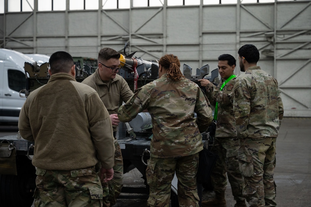 U.S. Air Force Airmen from the 356th Fighter Generation Squadron compete in the 2026 Annual Load Competition at Eielson Air Force Base, Alaska, Jan. 23, 2026.