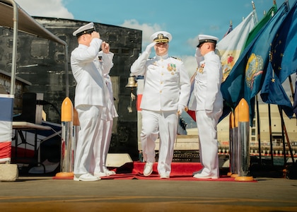 JOINT BASE PEARL HARBOR-HICKAM, Hawaii (Nov. 18, 2025) - Cmdr. Bill Murphy, commanding officer of Los Angeles-class fast-attack submarine USS Columbia (SSN 771), departs the change of command ceremony for Columbia at Joint Base Pearl Harbor-Hickam, Hawaii, Nov. 18, 2025. Columbia is assigned to Submarine Squadron 7 and is capable of supporting various missions, including anti-submarine warfare, anti-surface ship warfare, strike warfare, special operations forces support, and intelligence, surveillance, and reconnaissance. (U.S. Navy photo by Mass Communication Specialist 2nd Class Nicholas Russell)