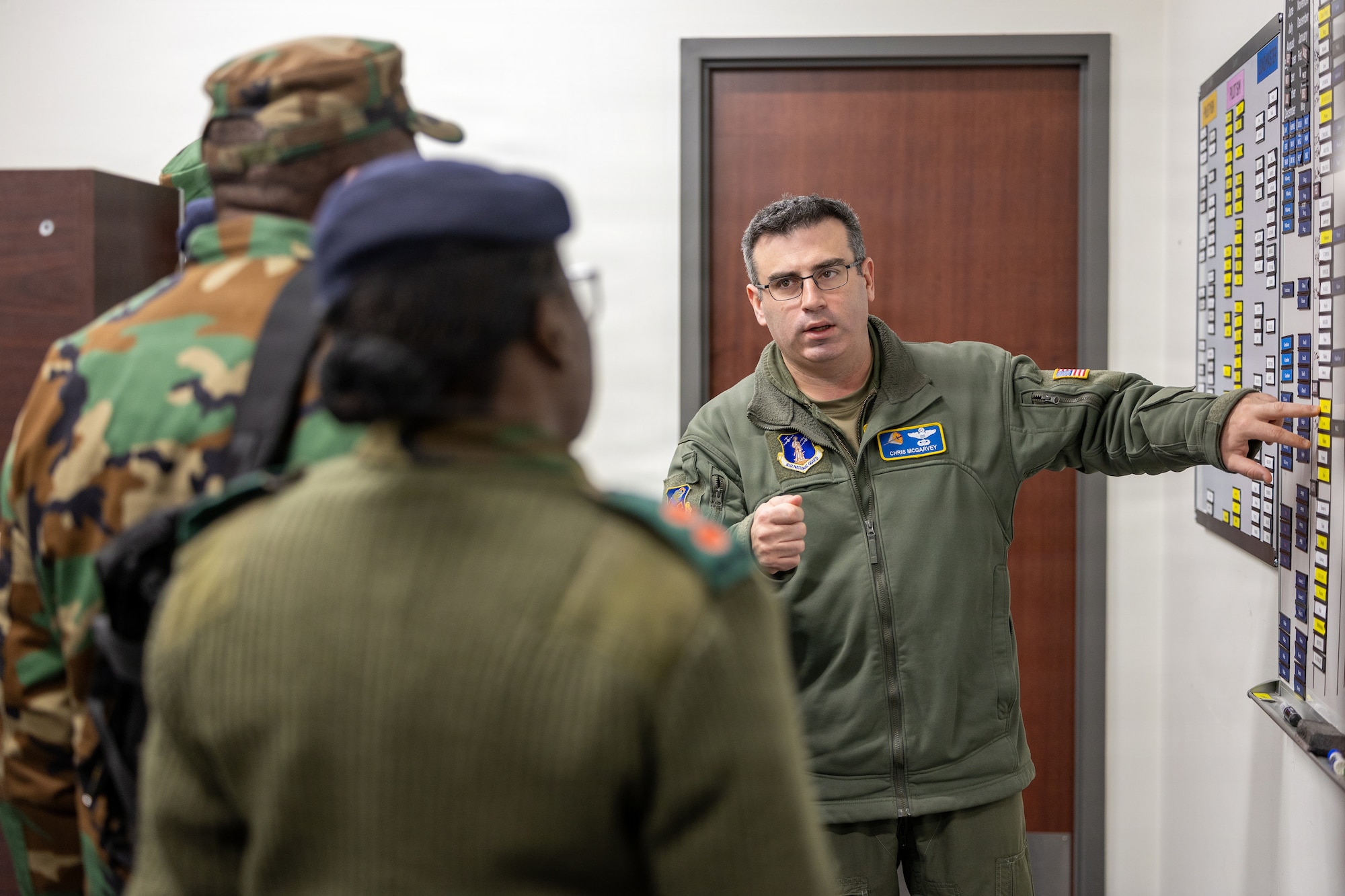U.S. Air Force Lt. Col. Chris J. McGarvey, 145th Operations Group, chief of standardization and evaluation, explains how their pilots remain operationally ready during required checkrides at the Charlotte Air National Guard Base, Charlotte, N.C., Jan. 15, 2026.