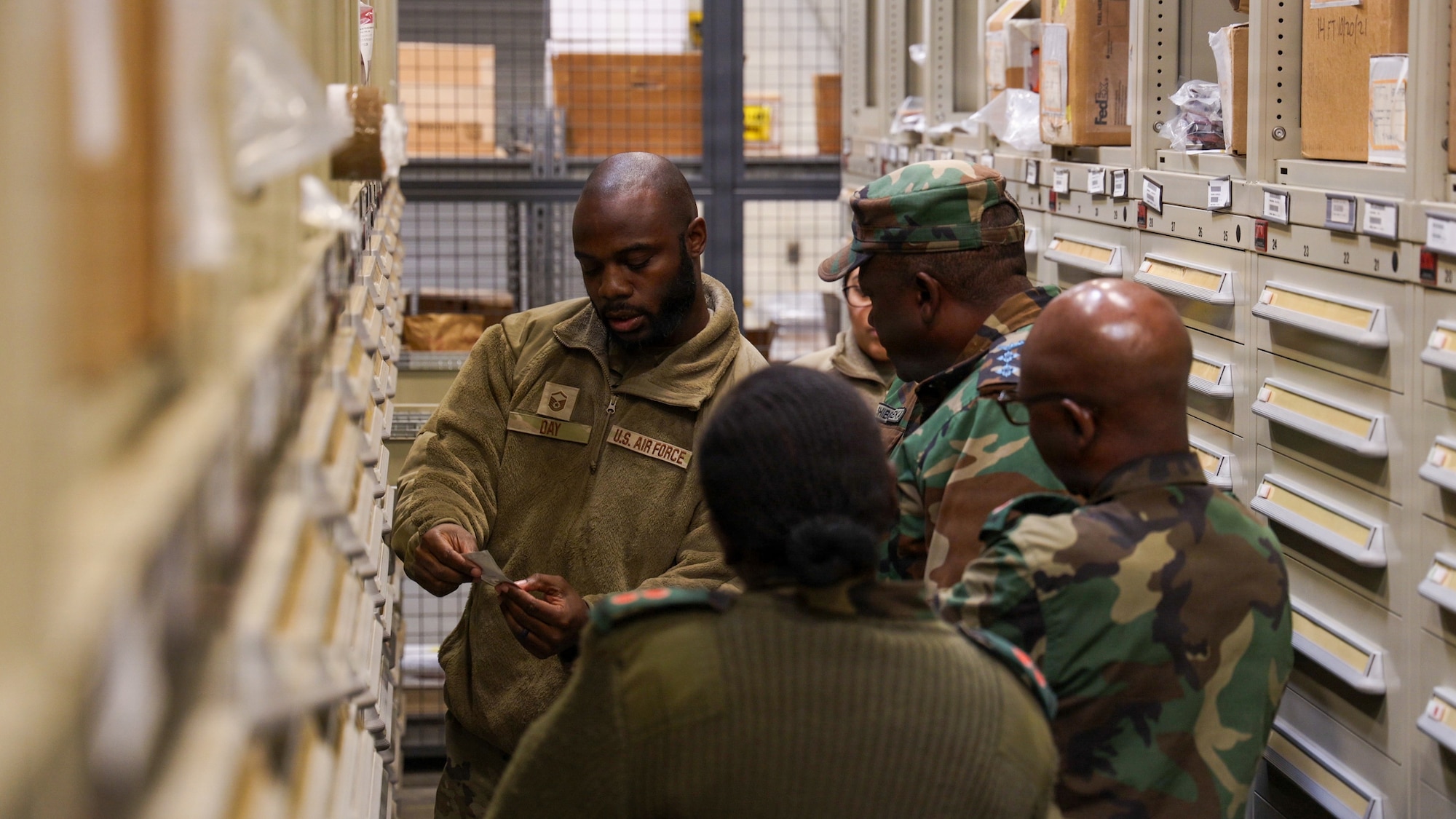 U.S. Air Force Master Sgt. DeMario M. Day, 145th Logistics Readiness Squadron, asset management supervisor, explains the concept of shelf life to the members of the Malawian and Zambian air forces at the Charlotte Air National Guard Base, Charlotte, N.C., Jan. 15, 2026.