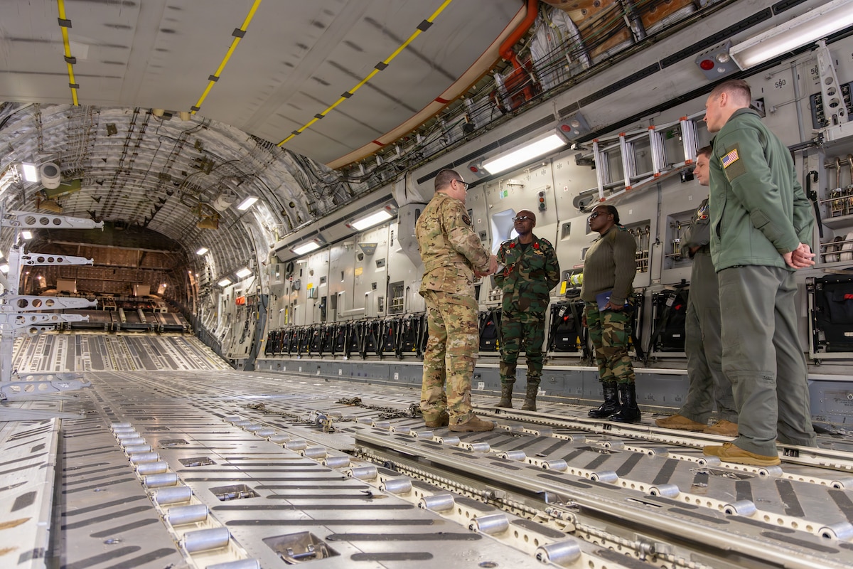 Members of the 145th Airlift Wing and the Malawi Air Force interact with each other inside a C-17 Globemaster III at the Charlotte Air National Guard Base, Charlotte, N.C., Jan. 13, 2026.