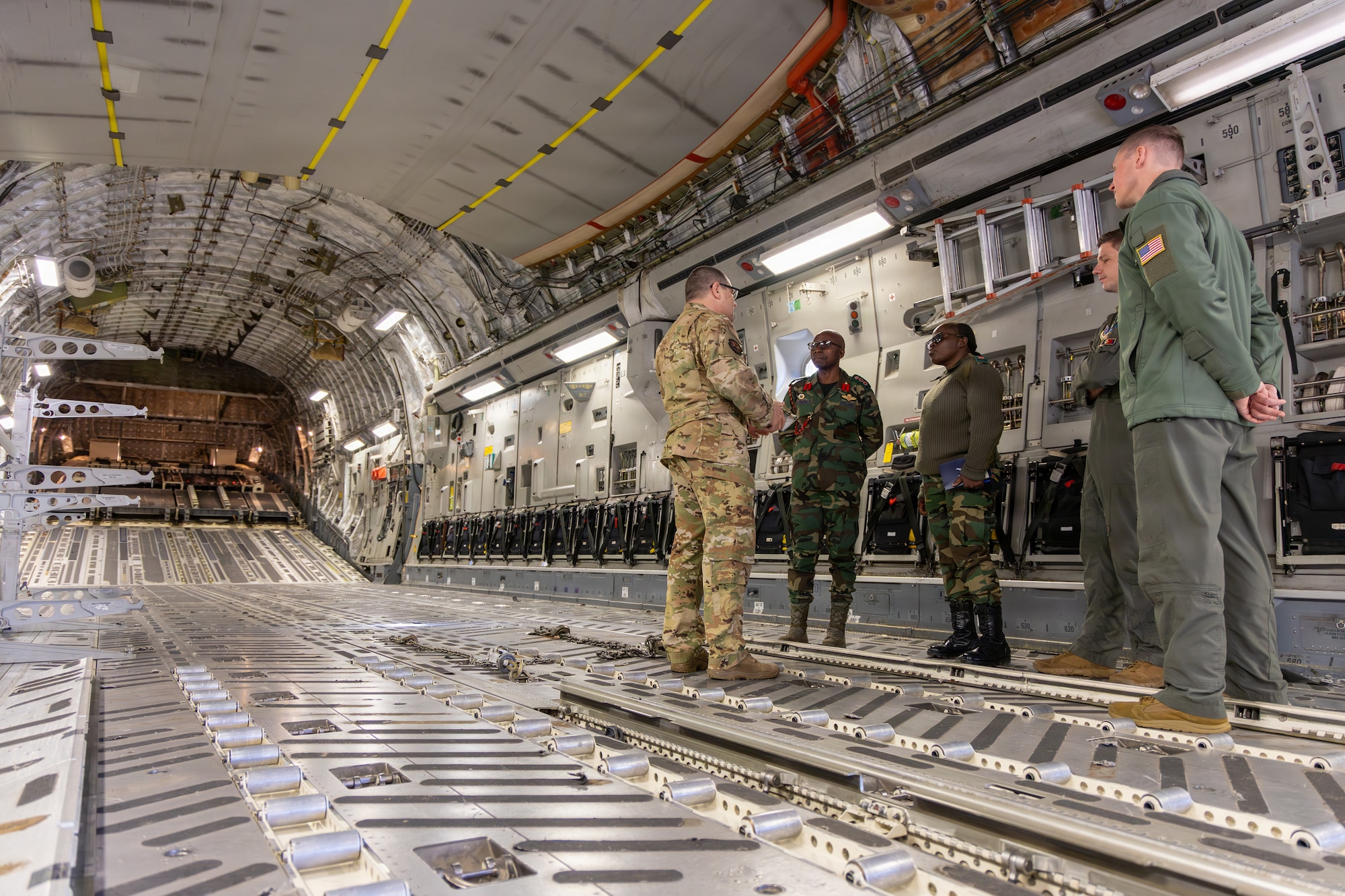 Members of the 145th Airlift Wing and the Malawi Air Force interact with each other inside a C-17 Globemaster III at the Charlotte Air National Guard Base, Charlotte, N.C., Jan. 13, 2026.