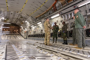 Members of the 145th Airlift Wing and the Malawi Air Force interact with each other inside a C-17 Globemaster III at the Charlotte Air National Guard Base, Charlotte, N.C., Jan. 13, 2026.