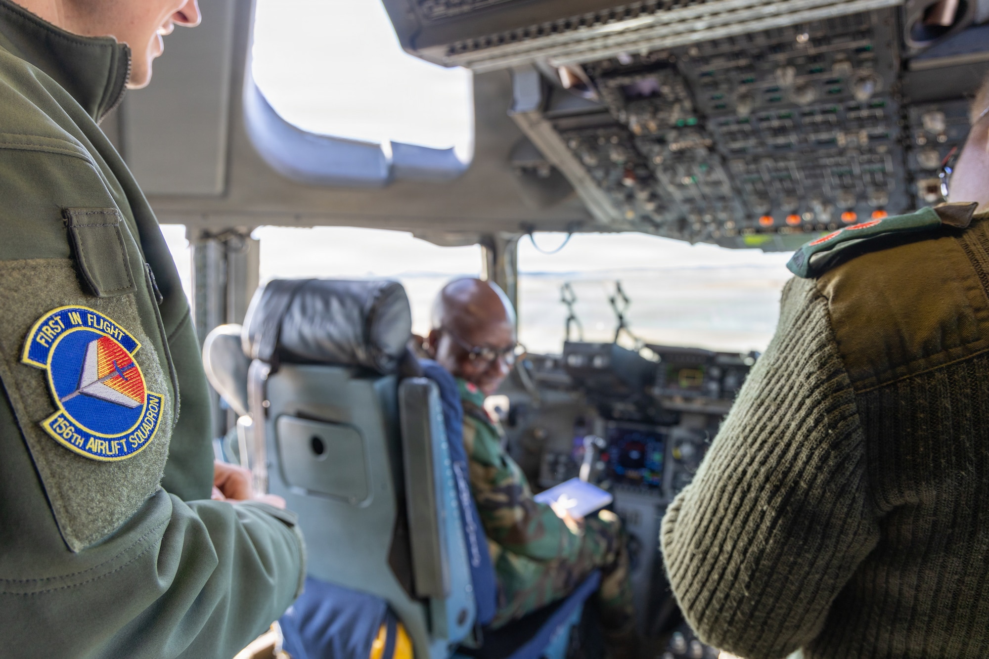 Members of the Malawi Air Force observe the cockpit of a C-17 Globemaster III at the Charlotte Air National Guard Base, Charlotte, N.C., Jan. 13, 2026.