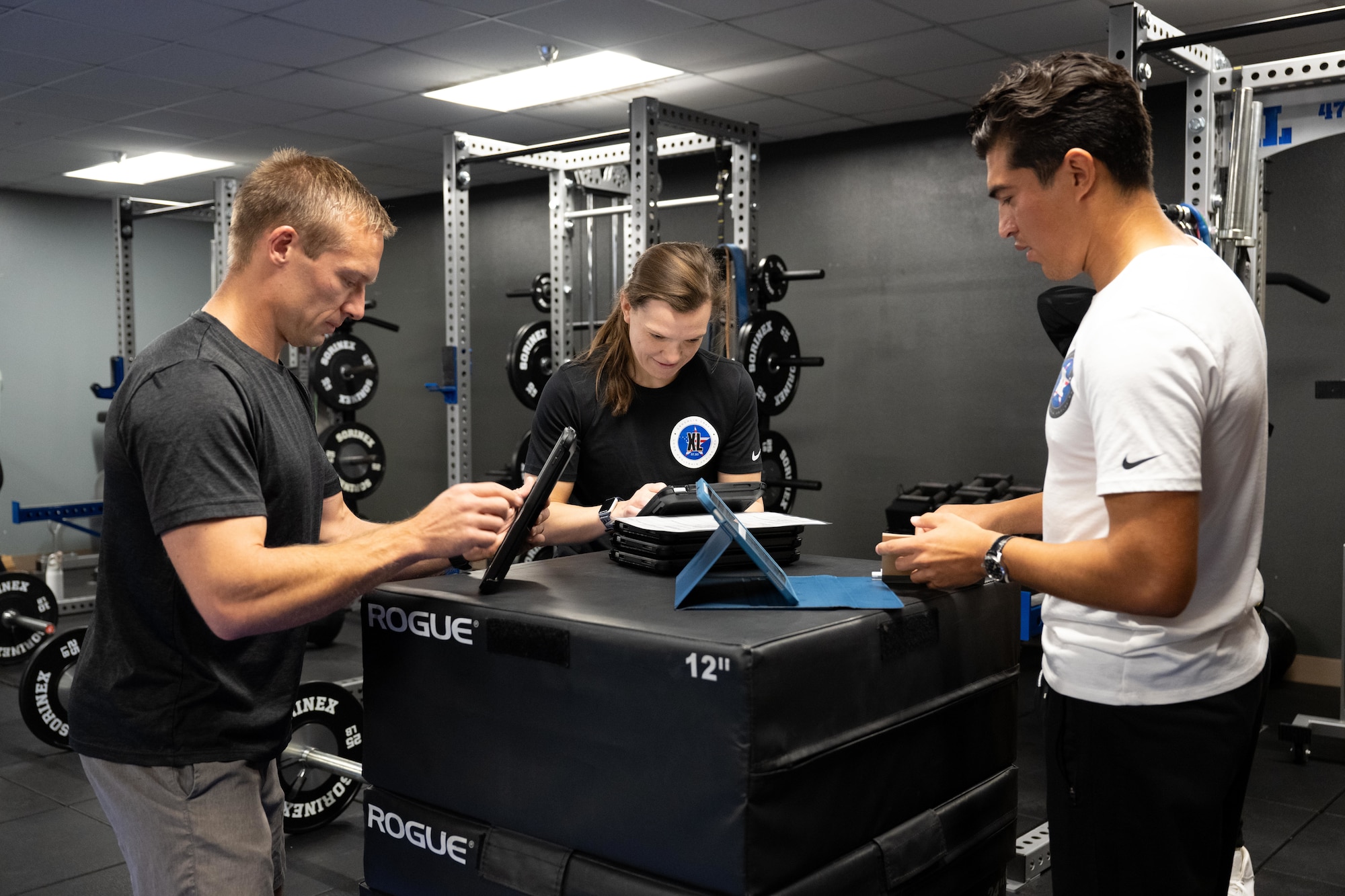 Airmen and Comprehensive Readiness For Aircrew Flying Training CRAFT performance staff conduct integrated physical and cognitive training inside the Tactical Athlete Center at Laughlin Air Force Base, Texas, Jan. 12, 2025. The center combines strength and conditioning with cognitive performance exercises to prepare aircrew to operate under physical and mental stress similar to operational flying environments. (Air Force photo by Airman 1st Class Harrison Sullivan)