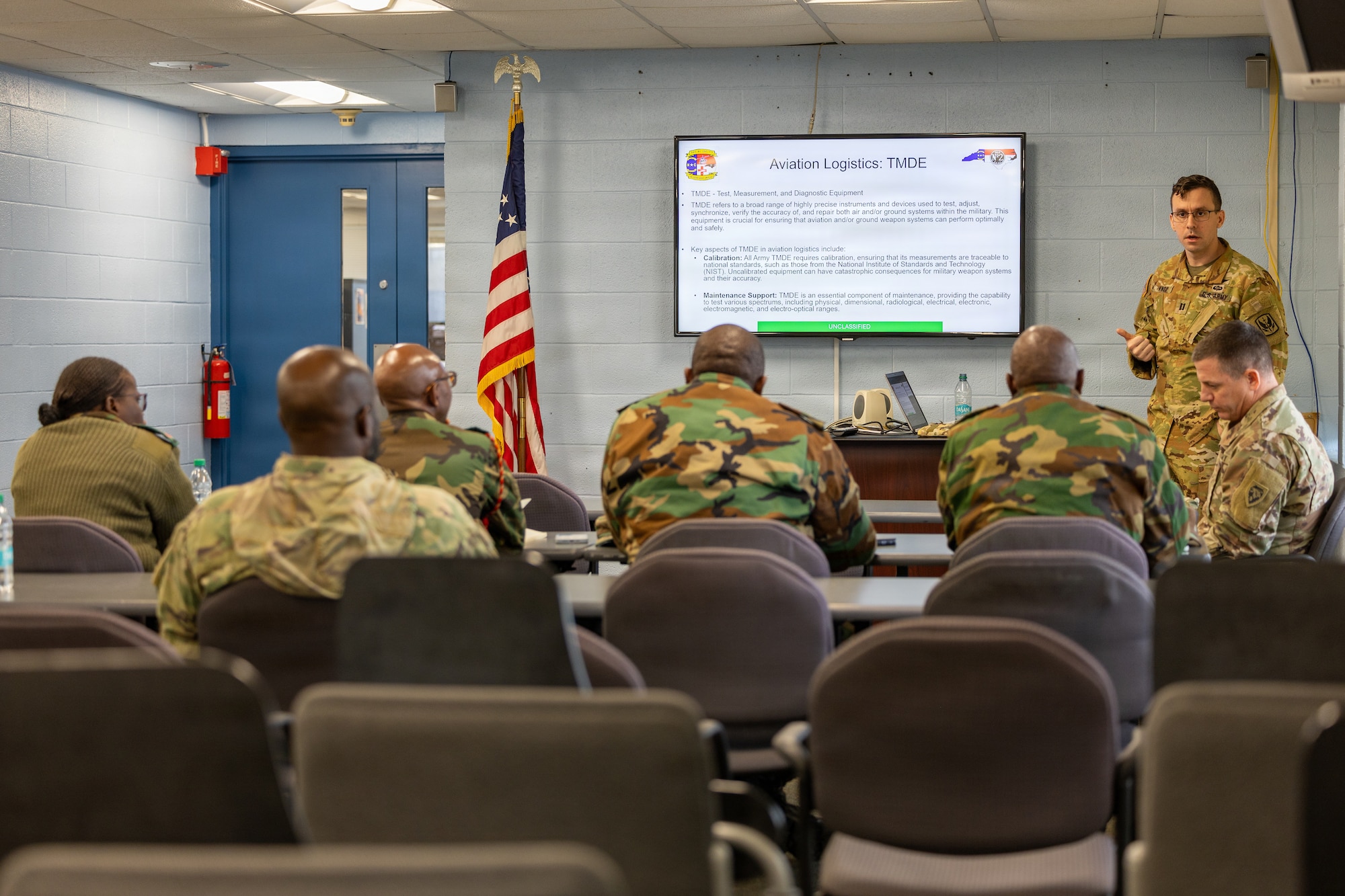 U.S. Army Captain Jacob T. Knox, 449th Combat Aviation Brigade Headquarters, logistics management officer, conducts a presentation on aviation logistics at Army Aviation Support Facility No. 2, Salisbury, N.C., Jan. 14, 2026.