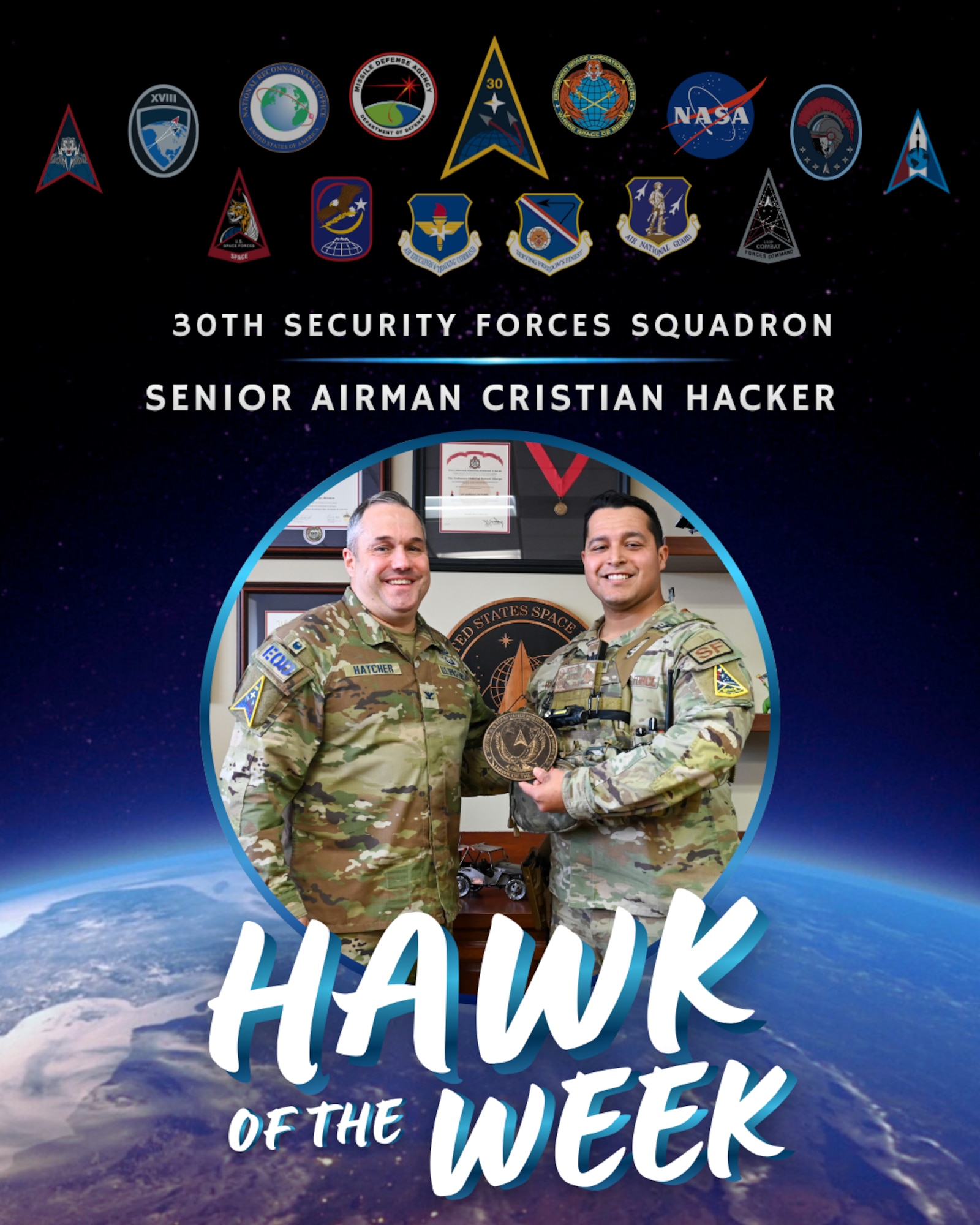 U.S. Space Force Col. Dorian Hatcher, left, Space Launch Delta 30 deputy commander, presents Vandenberg’s Hawk of the Week Award to Senior Airman Cristian Hacker, right, 30th Security Forces Squadron military working dog handler, during a weekly installation leadership meeting at Vandenberg Space Force Base, Calif., Jan. 21, 2026. Each week, the Hawk of the Week award is granted to an outstanding Guardian, Airman, or government civilian, highlighting their unique personality, workplace achievements, and contributions made to Vandenberg’s space and test launch missions. (U.S. Space Force graphic by Airman 1st Class Olya Houtsma)