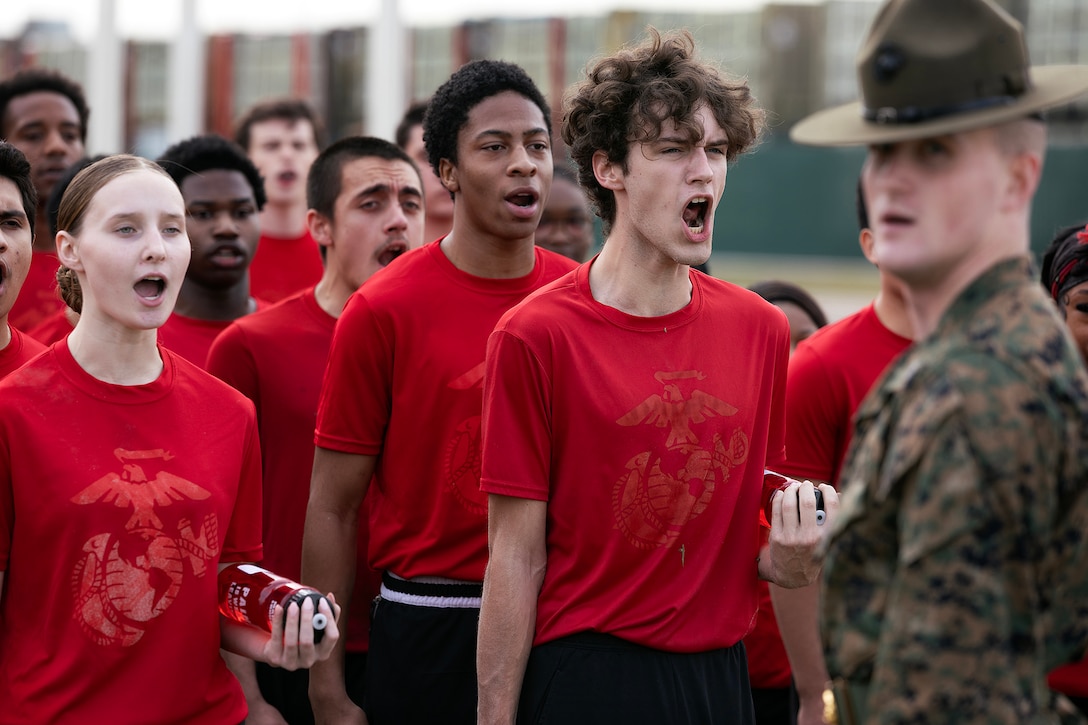 Young men and women from across Georgia and Florida stand in formation and recite the enlisted Marine Corps ranks during a poolee function Jan. 24 at Marine Corps Support Facility Blount Island, Florida. The event, hosted by Marine Corps Recruiting Station Jacksonville and supported by drill instructors from Marine Corps Recruit Depot Parris Island in South Carolina, tested the physical and mental readiness of future Marines as part of their preparation for recruit training. (Official Marine Corps photo by Dustin Senger)