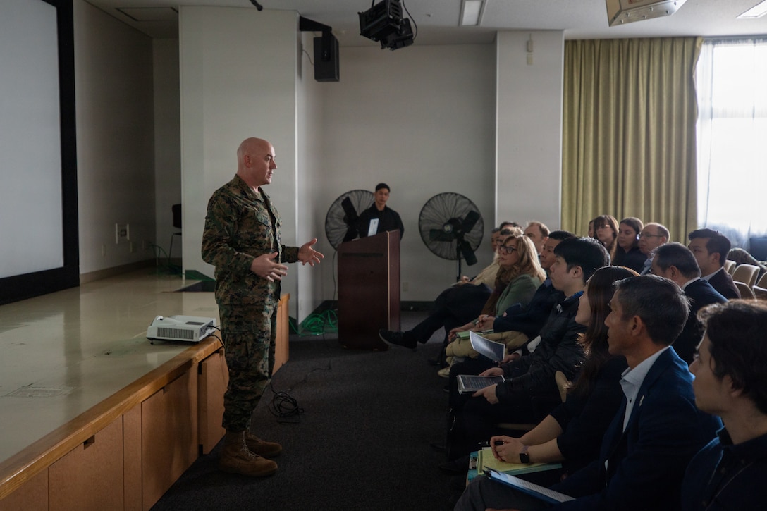 U.S. Marine Corps Col. Kenneth Rossman, the commanding officer of Marine Corps Air Station Iwakuni, and a Pennsylvania native, speaks to members of the Consular Corps in Japan during a subject matter expert exchange before Exercise Nankai Rescue 2026 at Marine Corps Air Station Iwakuni, Japan, Jan. 23, 2026. The SME exchange allowed MCAS Iwakuni and consular leadership in Japan to ensure unified understanding of each other's responsibilities, specifically in the event of a natural disaster. Exercise Nankai Rescue is a full-scale exercise focused on enhancing the bilateral coordination between the U.S. and Japan in support of humanitarian and disaster relief efforts. (U.S. Marine Corps photo by Cpl. Colin Thibault)