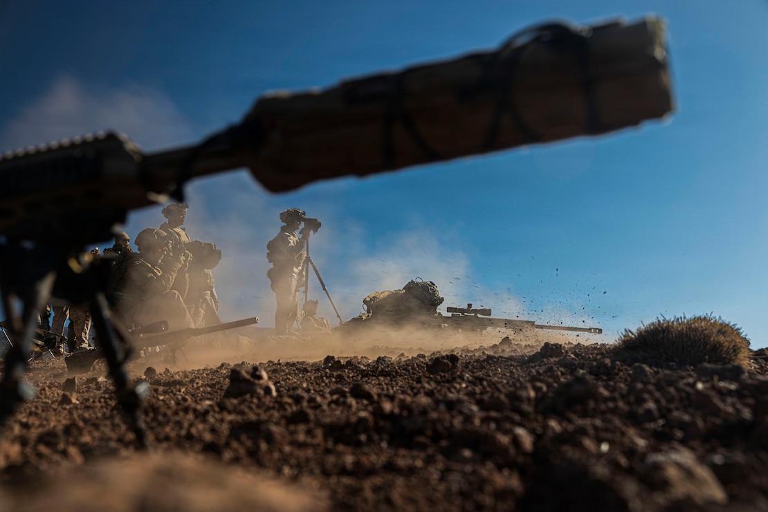 U.S. Marine Corps Cpl. Uriel Chunjuraez, a radio operator with 3rd Littoral Combat Team, 3rd Marine Littoral Regiment, 3rd Marine Division, fires an M107 .50-caliber special application scoped rifle during a live-fire range at Pohakuloa Training Area, Hawaii, Jan. 19, 2026.
