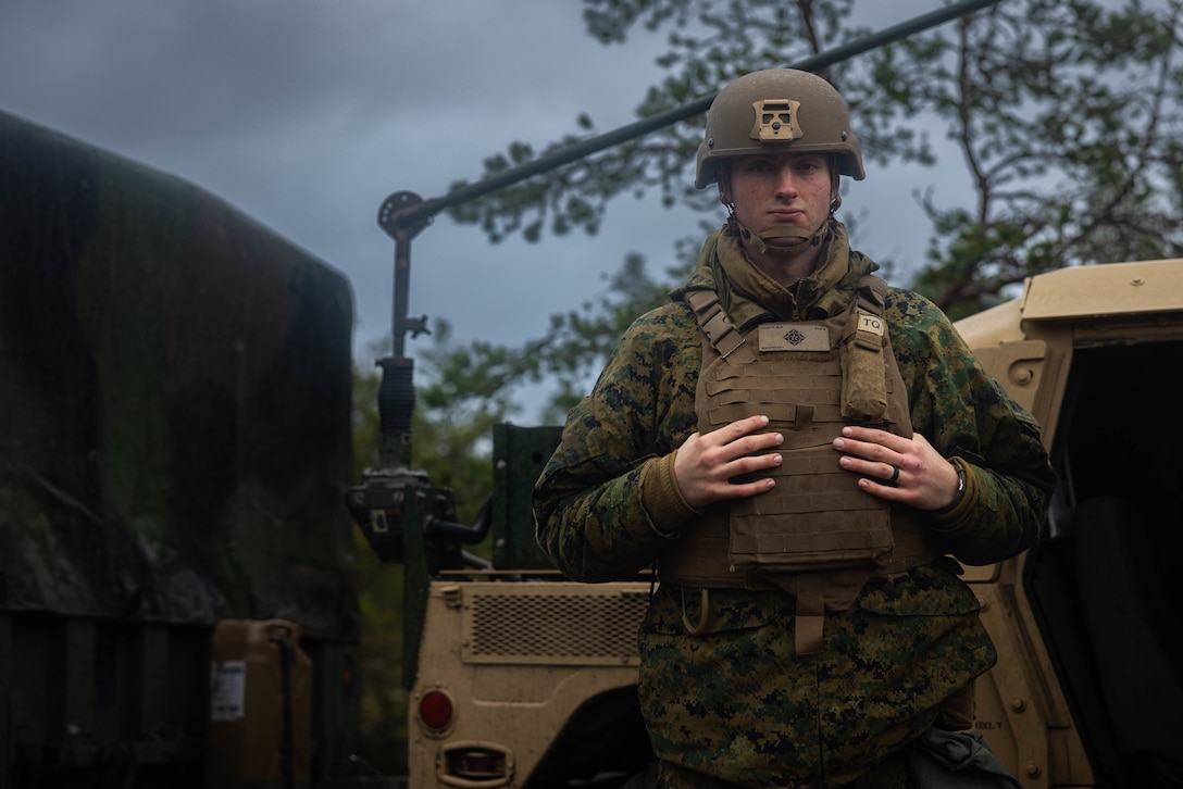 U.S. Marine Corps Cpl. Austin Scott, a data systems administrator with Combat Logistics Battalion 6, Combat Logistics Regiment 2, 2nd Marine Logistics Group, poses for a photo during Exercise Freezing Winds 2025 in Gylto, Finland, Dec. 1, 2025. The Cisco 1835 router works in tangent with the Star Shield communication system to provide internet capabilities for a variety of classification levels in an austere environment. Freezing Winds is conducted to increase interoperability between Marines, Finland, and NATO Allies by executing combined amphibious operations in and around the Baltic Sea littorals, and is part of a regularly occurring series of exercises in northern Europe that demonstrates the capability to deploy and train Marines and Sailors in support of the NATO Alliance. Scott is a native of California. (U.S. Marine Corps photo by Lance Cpl. Brady V. Hathaway)