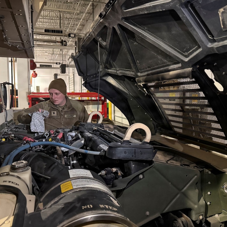 Spc. Cory A. Carpenter, 68W, a combat medic specialist, with Company C, 328th Brigade Support Battalion conducts preventive maintenance checks and services. Preparation is crucial as the unit gears up for domestic operations missions in support of the Pennsylvania Emergency Management Agency, the Pennsylvania Department of Transportation and the Pennsylvania State Police during Winter Storm Fern. (Pennsylvania National Guard Photo)