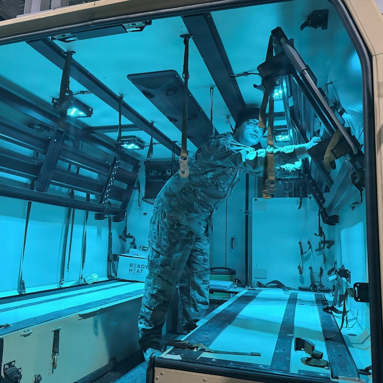 Pfc. Justin Derr, a combat medic specialist, with Company C, 328th Brigade Support Battalion, conducts a vital equipment inspection inside an M997 Ambulance as part of the Pennsylvania National Guard’s commitment to ensure optimal readiness for domestic operations response missions within Dauphin, Lancaster, and Lebanon counties in the wake of Winter Strom Fern. (Pennsylvania National Guard Photo)