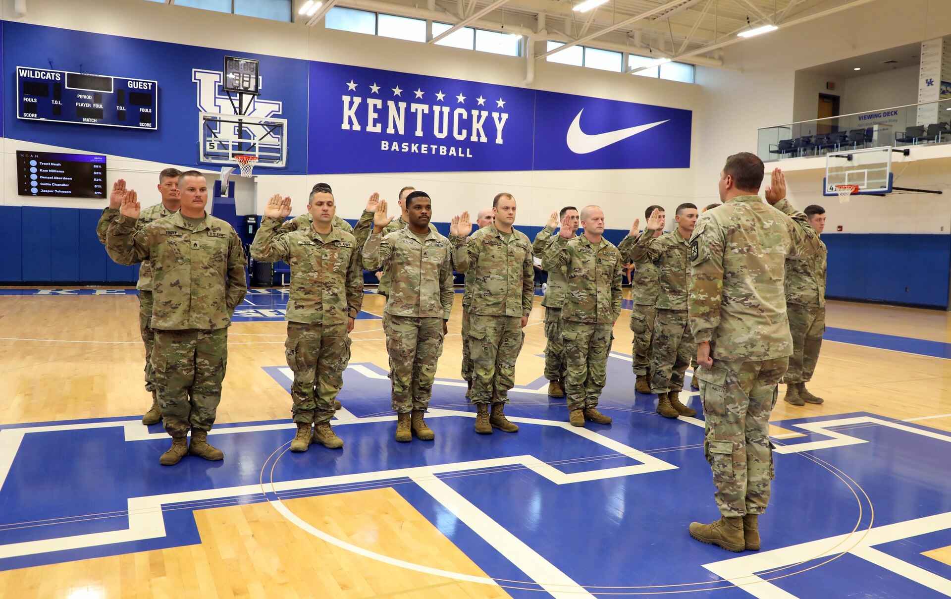 The twenty three Soldiers were there to have a reenlistment ceremony on the practice floor.