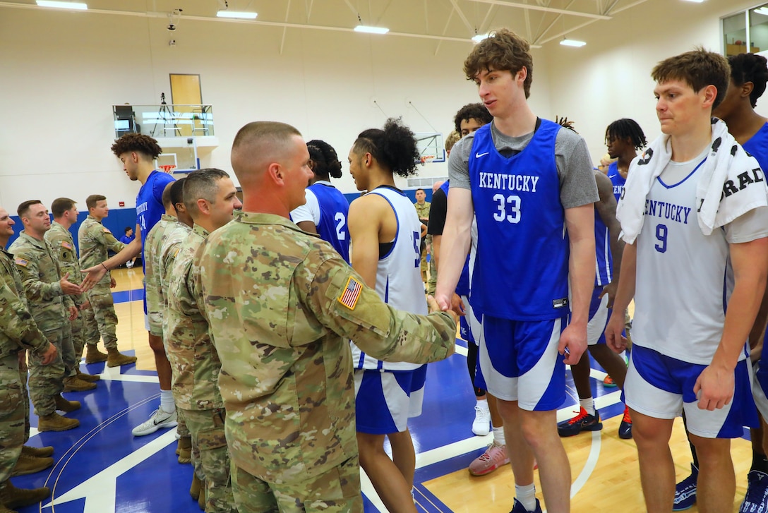 The twenty three Soldiers were there to have a reenlistment ceremony on the practice floor.