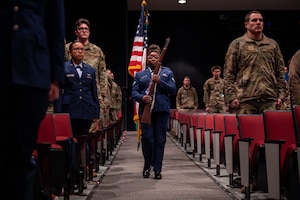Alpha Flight Honor Guardsmen prepare to present the colors during a 92nd Air Refueling Wing Honor Guard graduation ceremony at Fairchild Air Force Base, Washington, Jan. 16, 2026. During the ceremony 20 Airmen were recognized as Team Fairchild’s newest honor guard members. (U.S. Air Force photo by Senior Airman Morgan St Marks)