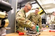 Students and staff with the 91J10 Quartermaster and Chemical Equipment Repairer Course complete hands-on training Jan. 9, 2026, at Regional Training Site-Maintenance at Fort McCoy, Wis. 91J (“Ninety-One Juliet”) is a U.S. Army military occupational specialty for Quartermaster and Chemical Equipment Repairer. Soldiers in this MOS are trained to perform maintenance, service, and repair on quartermaster gear and chemical equipment, including things like mobile water purification systems, laundry systems, heaters, decontamination units, and other special-purpose equipment. The coursework emphasizes reading technical manuals, using tools safely, and learning to troubleshoot and fix these types of systems. (U.S. Army Photo by Scott T. Sturkol, Fort McCoy Public Affairs Office)
