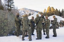 U.S. Marines and Sailors with Combat Logistics Battalion 24, Combat Logistics Regiment 27, 2nd Marine Logistics Group, eat hot meals during Mountain Training Exercise 1-26 at Marine Corps Mountain Warfare Training Center in Bridgeport, California, Jan. 18, 2026. Exercises like MTX 1-26 prove Marines’ ability to provide flexible and responsive combat service support during high intensity combat operations in contested and mountainous terrain. (U.S. Marine Corps photo by Lance Cpl. Isabella Ramos)