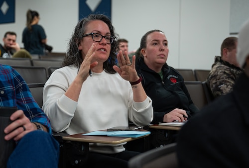 Base housing resident clarifies concerns during the Utility Allowance Town Hall at Maxwell Air Force Base, Alabama, Jan. 20, 2026.
