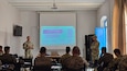 U.S. Army Staff Sgt. Ryan Karolides, left, civil affairs team sergeant, teaches members of the Tunisian Armed Forces and Brigade des Forces Spéciales the basics of civil affairs operations at Camp Ramadia, Tunisia, Oct. 10, 2025. Karolides is assigned to Civil Affairs Team Tunisia, Company Bravo, Civil Affairs Battalion, U.S. Army Southern European Task Force, Africa (SETAF-AF). The training he and his team are providing strengthen the U.S.-Tunisian relationship and enhances Tunisia's ability to manage civil-military operations for improved burden sharing. (Photo courtesy of Sgt. Matthew Rucker)