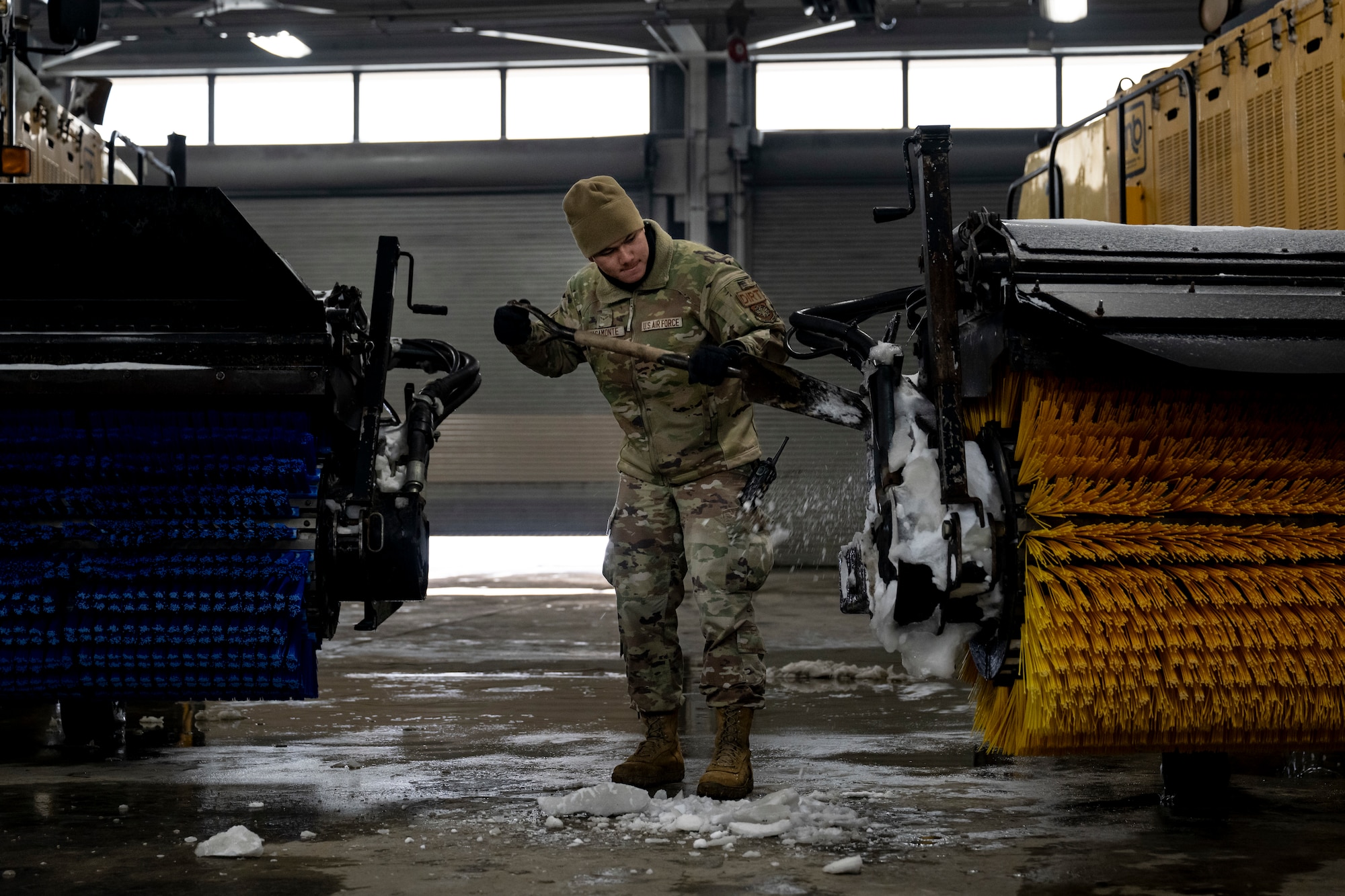 Photo of Andrews Airmen conducting snow removal operations
