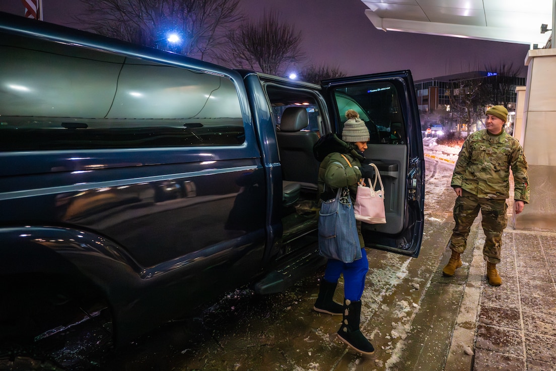 Tech. Sgt. Brendan Overstreet from the Kentucky Air National Guard’s 123rd Airlift Wing drops off Alicia Crawford at Norton Hospital Brownsboro in Louisville, Ky., Jan. 26, 2026, for her shift as a medical-surgical nurse. Crawford was unable to drive to work after Winter Storm Fern dumped around 10 inches of snow and ice in across the city Jan. 24 and 25, leaving many secondary roads and parking lots impassable with two-wheel-drive vehicles. More than 50 Kentucky Guard Airmen will remain on duty as long as needed, officials said. (U.S. Air National Guard photo by Dale Greer)