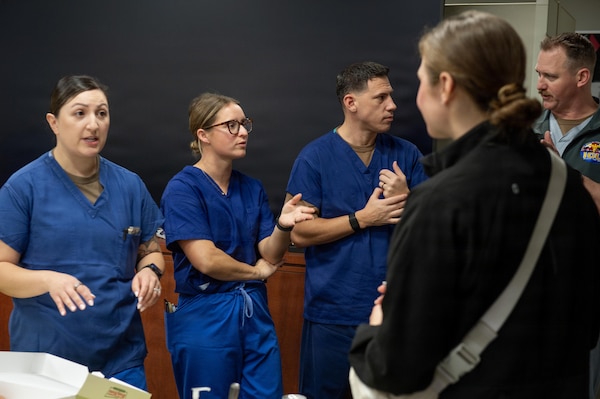 U.S. Navy Lt. Cmdr. Mayra Monarrez and Lt. Kylie Rodgers, certified registered nurse anesthetists, mentor and field questions from active duty nurses and corpsmen during a student registered nurse anesthetist open house event at Naval Medical Center San Diego, Jan. 23. The event is held annually during national CRNA week to recruit those interested in pursuing a career in anesthesiology via the SRNA training pipeline at Uniformed Services University. (U.S. Navy photo by Mass Communication Specialist Seaman Jason Afable)