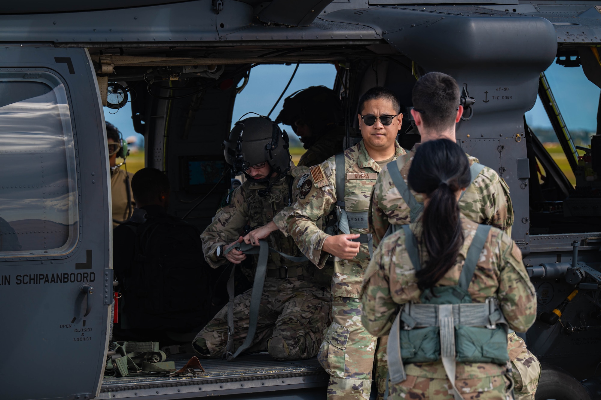 U.S. Air Force Airmen assigned to the 18th Operations Support Squadron weather flight, prepare for departure in an HH-60W Jolly Green II to Whiskey-174 from Kadena Air Base, Japan, Jan. 12, 2026. The operation expanded data coverage in the region and demonstrated Kadena’s ability to rapidly deploy weather sensors in austere locations. (U.S. Air Force photo by Senior Airman Jamal Berry II)