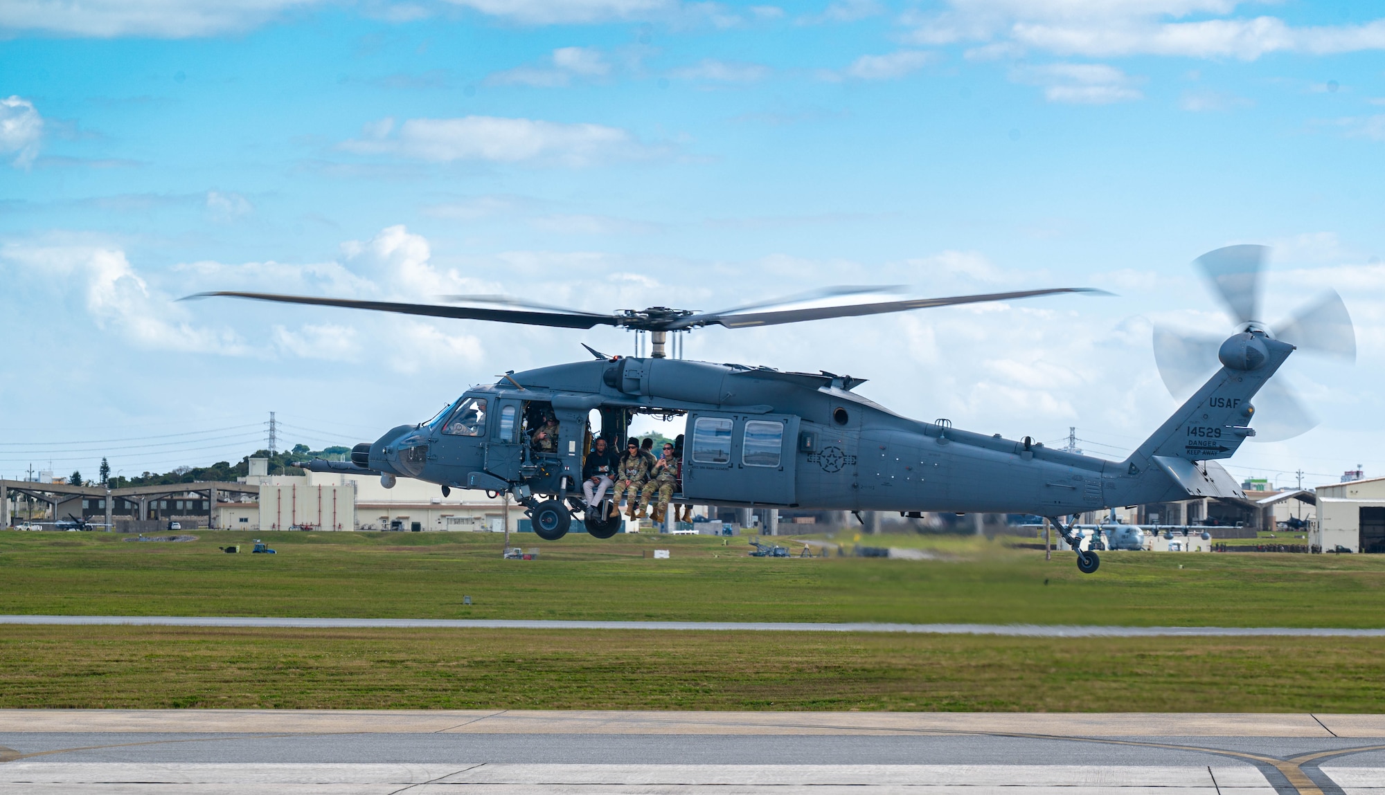 U.S. Air Force Airmen assigned to the 18th Operations Support Squadron weather flight take off in an HH-60W Jolly Green II to Whiskey-174 from Kadena Air Base, Japan, Jan. 12, 2026. The 18th OSS produces a Mission Execution Forecast for every flight, ensuring commanders have the data needed to plan and launch operations safely. (U.S. Air Force photo by Senior Airman Jamal Berry II)
