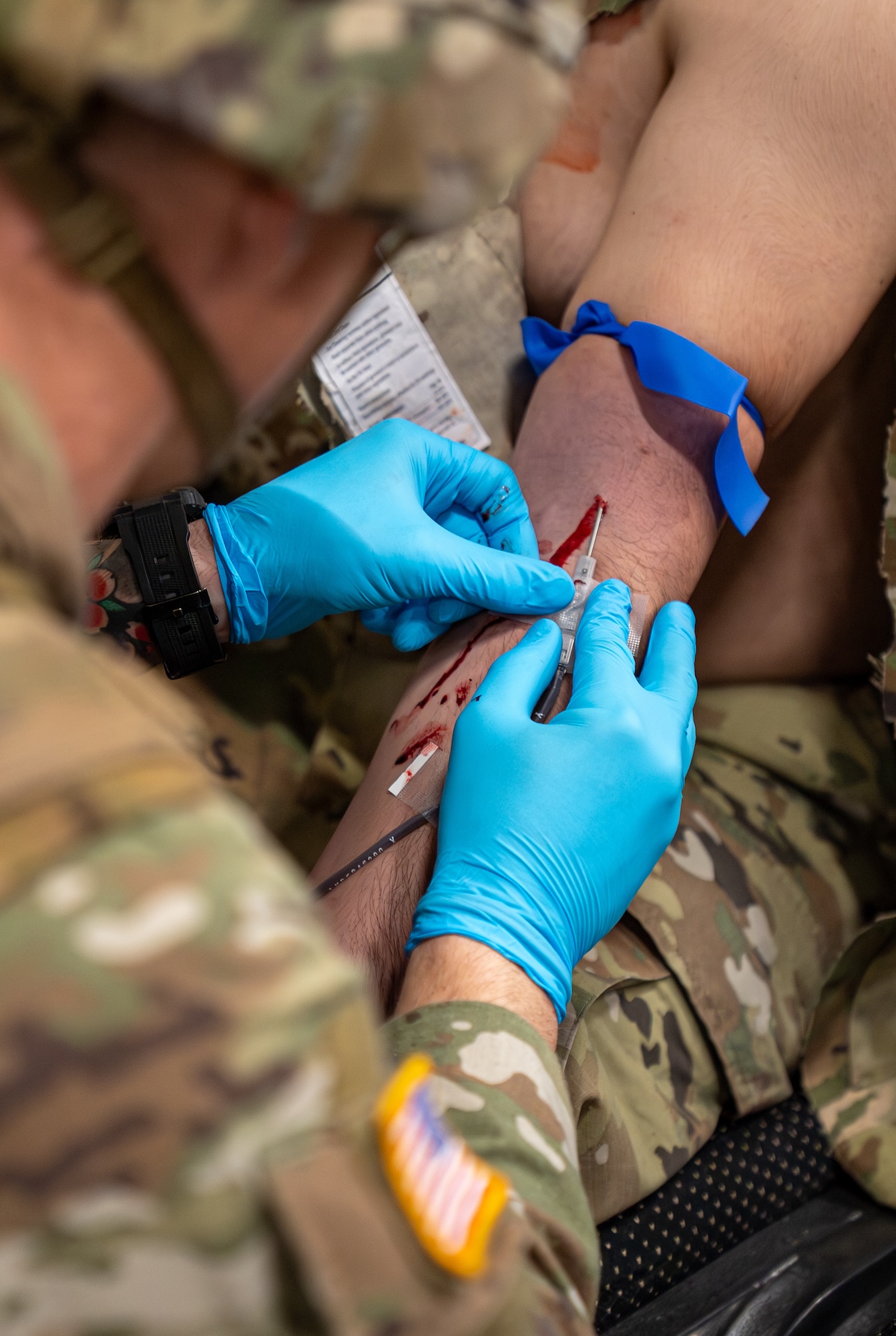 A syringe is used to draw blood during a medical course.