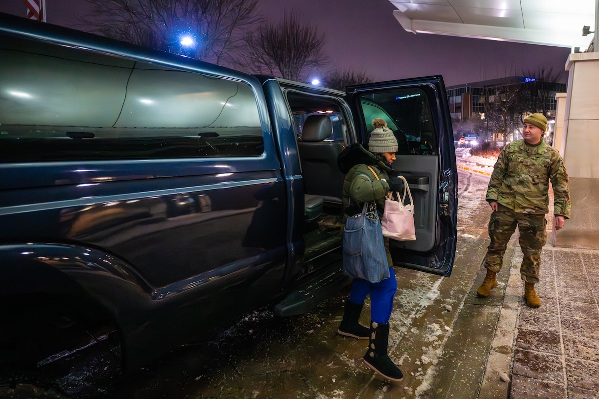Tech. Sgt. Brendan Overstreet from the Kentucky Air National Guard’s 123rd Airlift Wing drops off Alicia Crawford at Norton Hospital Brownsboro in Louisville, Ky., Jan. 26, 2026, for her shift as a medical-surgical nurse. Crawford was unable to drive to work after Winter Storm Fern dumped around 10 inches of snow and ice in across the city Jan. 24 and 25, leaving many secondary roads and parking lots impassable with two-wheel-drive vehicles. More than 50 Kentucky Guard Airmen will remain on duty as long as needed, officials said. (U.S. Air National Guard photo by Dale Greer)
