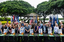 Family and friends attend a posthumous commission ceremony at Ke’ehi Lagoon Memorial State Park, Honolulu, Hi., Jan. 26, 2026. The ceremony was held to posthumously commission University of Hawaii ROTC cadets who died in combat during WWII. (U.S. Army photo by Pfc. Peter Bannister)