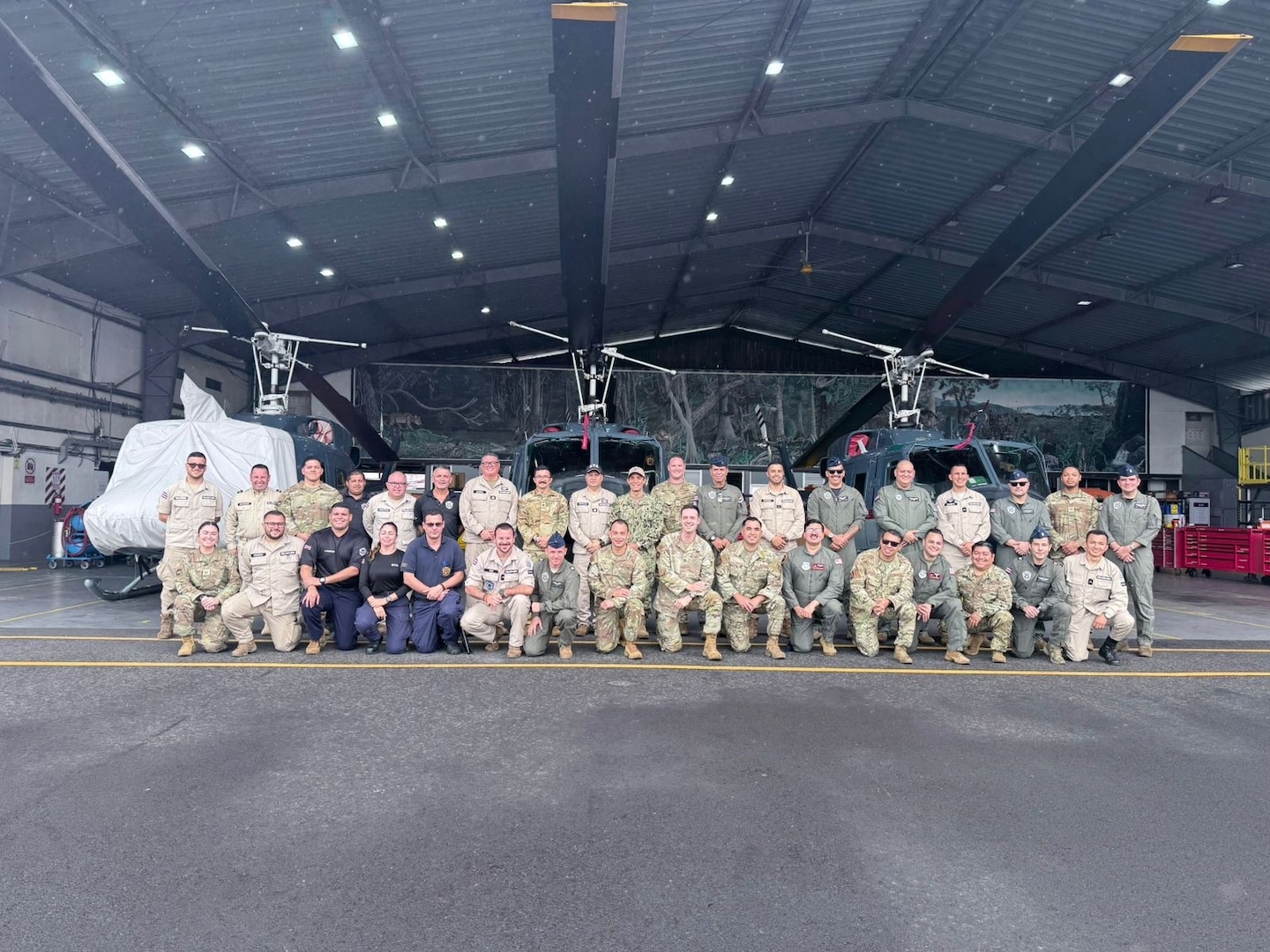 A group of People stand for a photo.