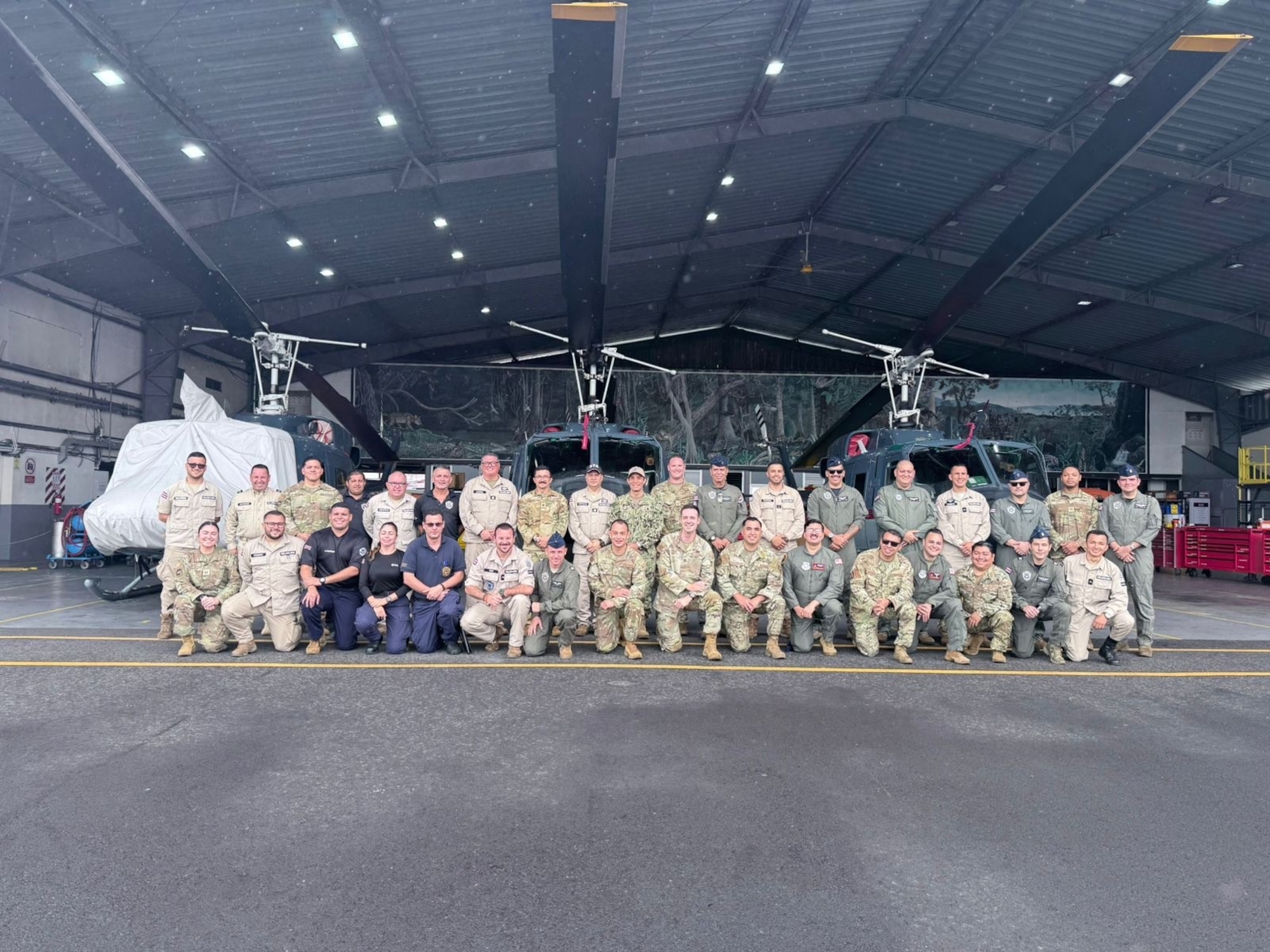 A group of People stand for a photo.