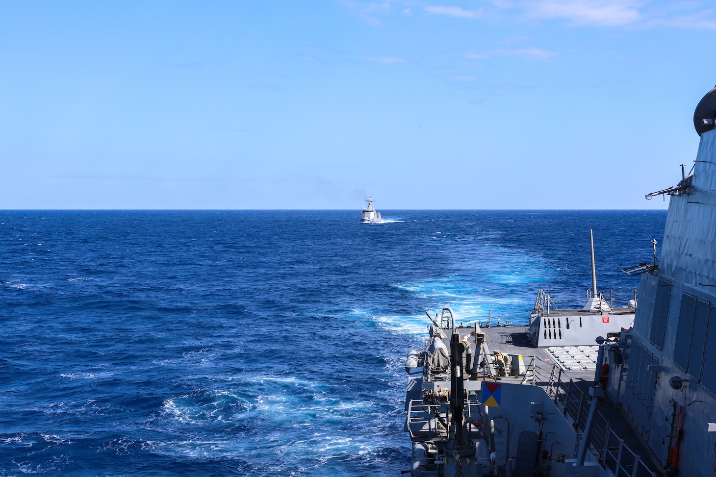 U.S. Navy Arleigh Burke-class guided-missile destroyer USS John Finn (DDG 113) sails in formation with Philippine Navy Jose Rizal-class frigate BRP Jose Rizal (FF-150) during the Maritime Cooperative Activity (MCA) in the Philippines’ Exclusive Economic Zone, Jan. 26, 2026.