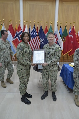 CAPTAIN Raynese Roberts, Commanding Officer U.S. Naval Hospital Naples, presents the Hospital Accreditation Program Certificate to CDR Ross Mullinax
Chief Medical Officer, U.S. Naval Hospital Naples, on behalf of U.S. Naval Hospital Naples.