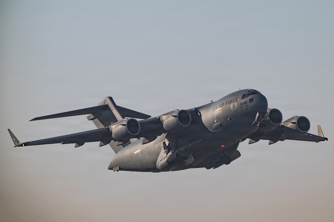 A C-17 Globemaster III aircraft takes off during a readiness exercise within the U.S. Central Command area of responsibility Jan. 22, 2026. The exercise is designed to strengthen Ninth Air Force’s (Air Forces Central) ability to disperse combat airpower throughout the CENTCOM area of responsibility, adding strategic ambiguity to adversary decision making. (U.S. Air Force photo by Tech. Sgt. Justin Norton)
