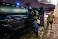 Tech. Sgt. Brendan Overstreet from the Kentucky Air National Guard’s 123rd Airlift Wing drops off Alicia Crawford at Norton Hospital Brownsboro in Louisville, Ky., Jan. 26, 2026, for her shift as a medical-surgical nurse.