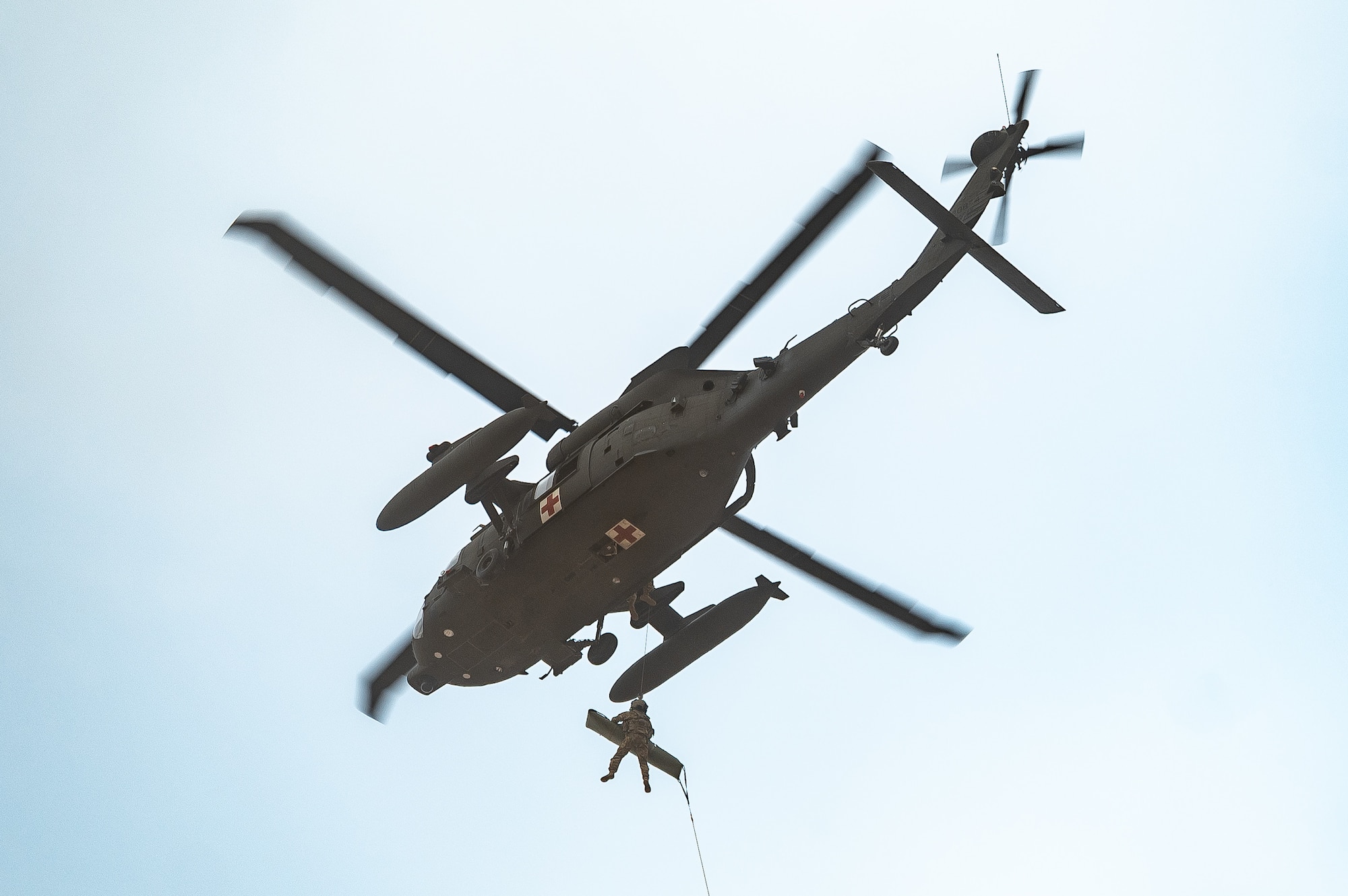U.S. Army National Guard soldiers demonstrate hoist operations and helicopter-loading procedures to 56th Fighter Wing honorary commanders