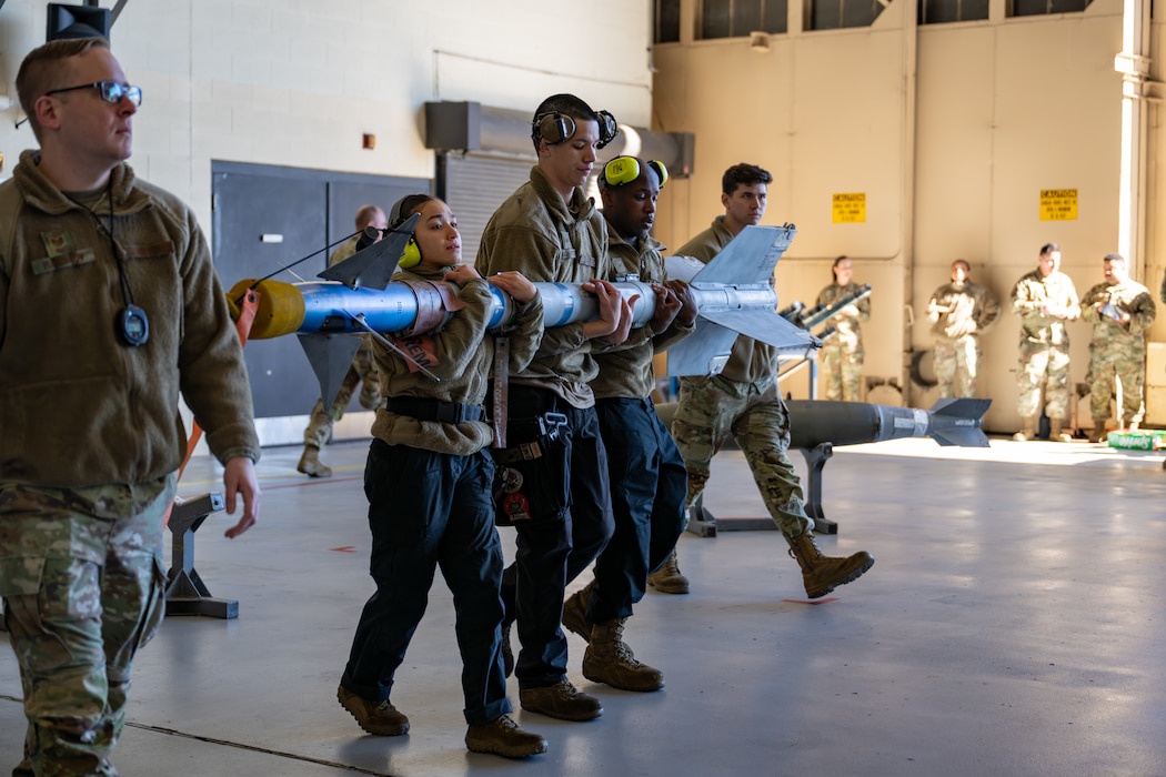 People carry a bomb.
