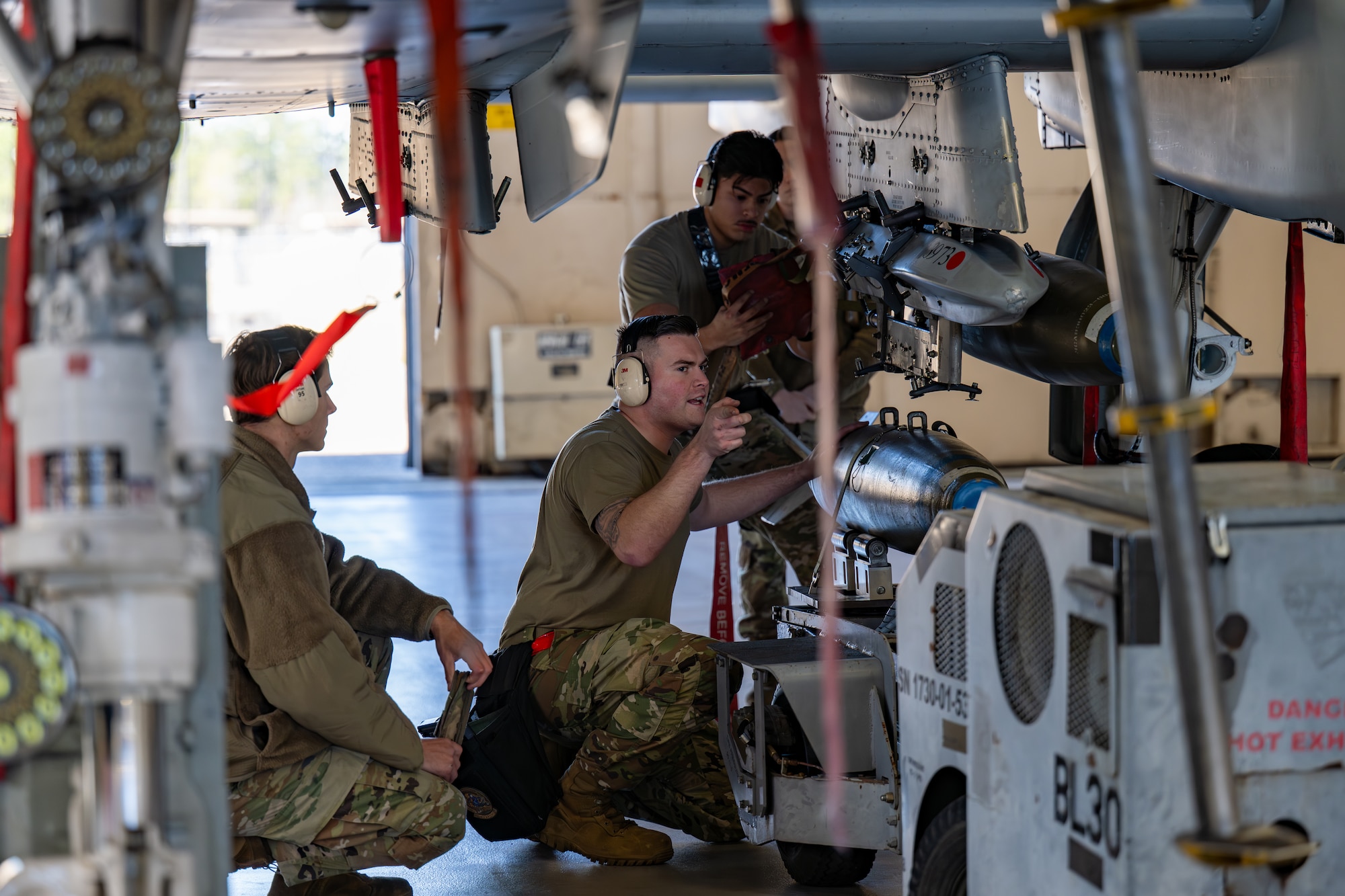 Man directs another as he drives.