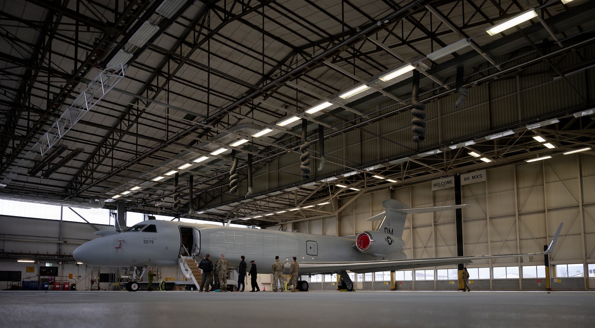 A U.S. Air Force EA-37B Compass Call aircraft assigned to the 55th Electronic Combat Group at Davis-Monthan Air Force Base, Arizona, is parked at Ramstein Air Base, Germany, as part of its first stop in the European theater for a scheduled road show, Jan. 26, 2026. The aircraft is also slated to visit Spangdahlem AB, Germany, and RAF Mildenhall, England, marking the platform’s introduction to Airmen, units and NATO Allies in the U.S. Air Forces in Europe area of responsibility. (U.S. Air Force photo by Senior Airman Edgar Grimaldo)