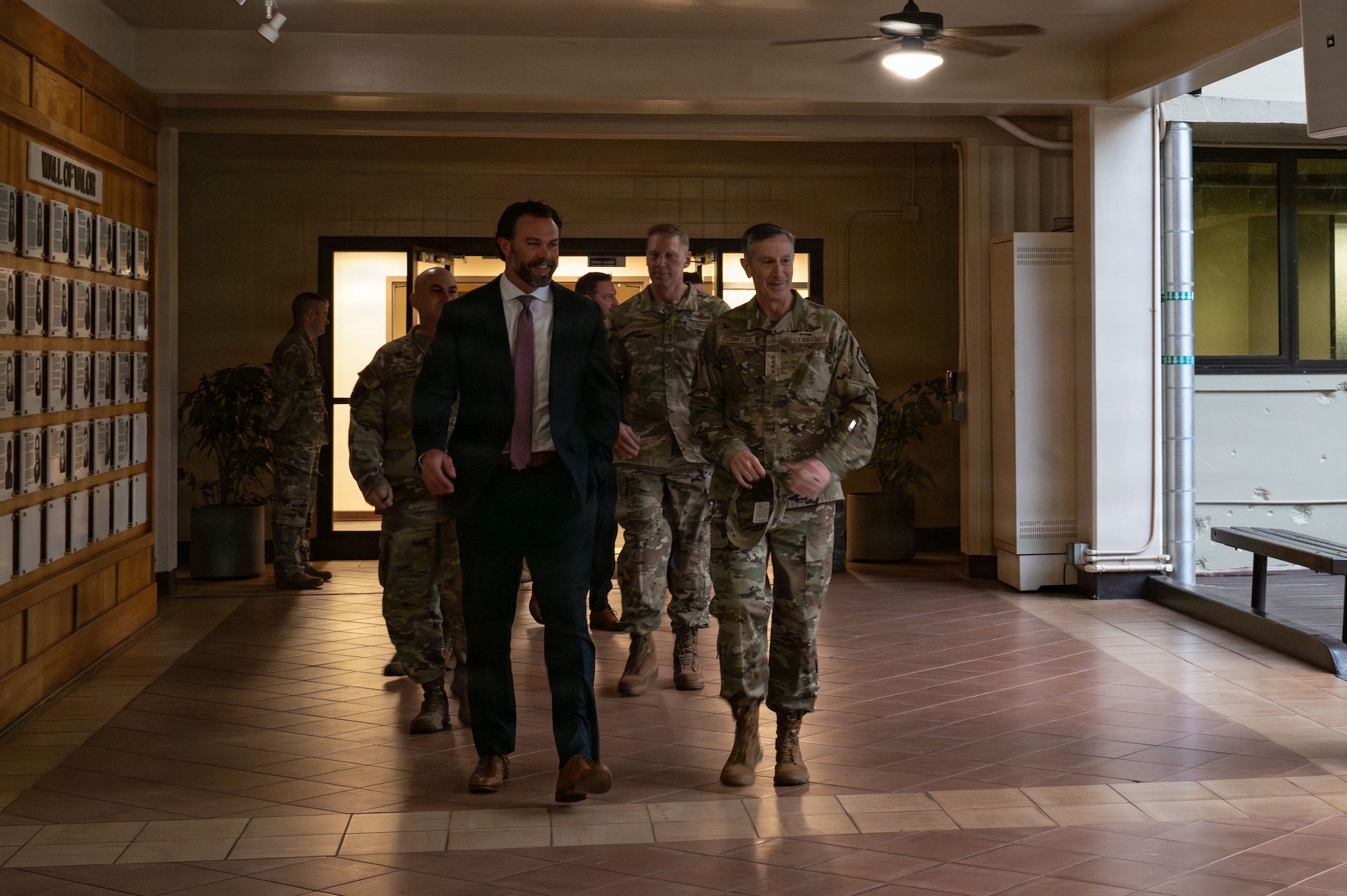 Under Secretary of the Air Force Matt Lohmeier walks with Gen. Kevin Schneider, Pacific Air Forces commander