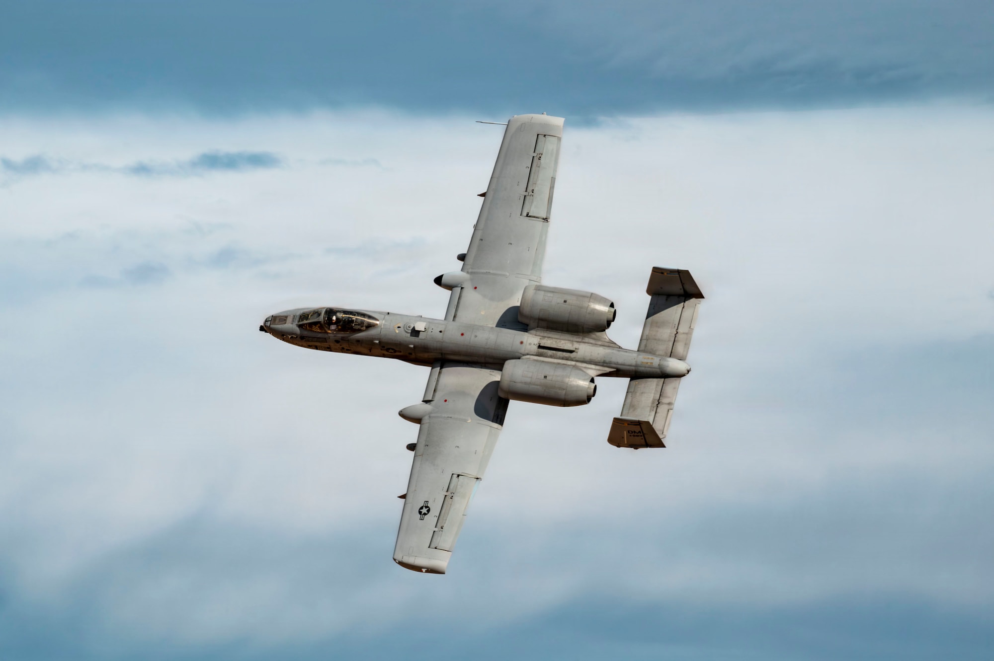 A U.S. Air Force A-10C Thunderbolt II aircraft assigned to the 357th Fighter Generation, flies over a training range in Gila Bend, Arizona, Jan. 23, 2025. Range flights enable aircrews to maintain operational readiness and familiarize themselves with local airspace. (U.S. Air Force photo by Airman 1st Class Samantha Melecio)