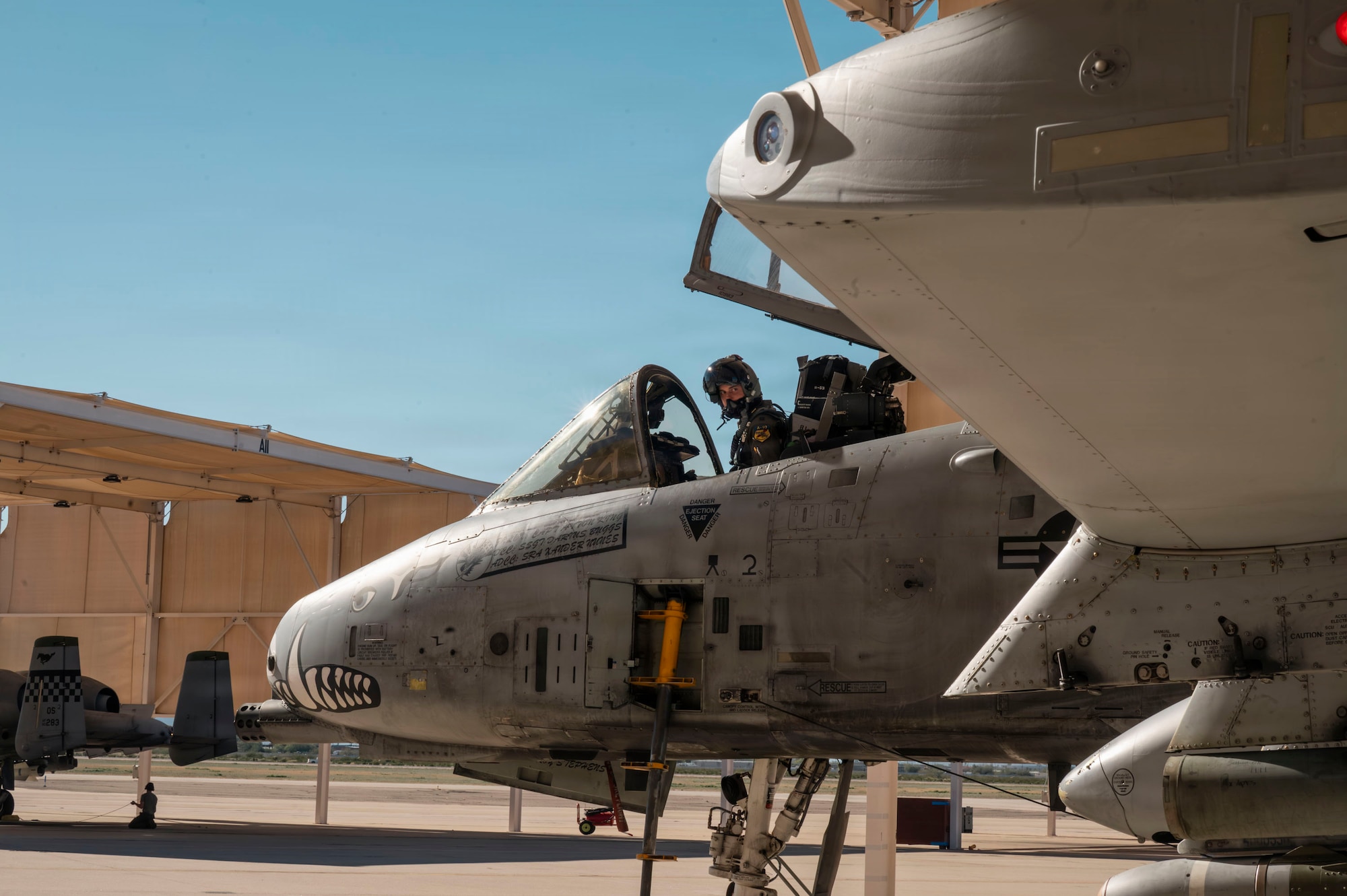 U.S. Air Force Capt. Steven Moyer, 357th Fighter Squadron A-10C Thunderbolt II aircraft student pilot, performs pre-flight checks at Davis-Monthan Air Force Base, Arizona, Jan. 13, 2026. Moyer was the final student from the squadron to fly a low-altitude surface attack sortie in an A-10. (U.S. Air Force photo by Airman 1st Class Samantha Melecio)