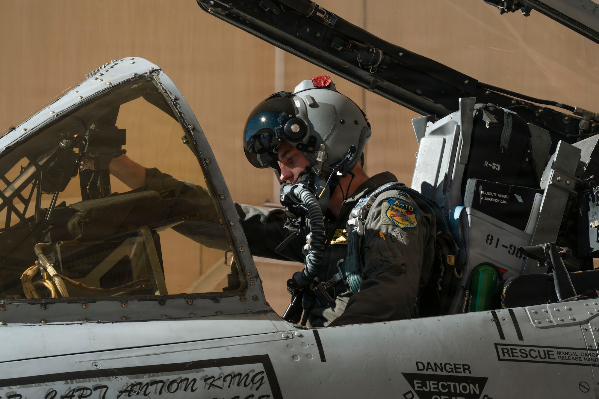 U.S. Air Force Capt. Steven Moyer, 357th Fighter Squadron A-10C Thunderbolt II aircraft student pilot, performs pre-flight checks at Davis-Monthan Air Force Base, Arizona, Jan. 13, 2026. Student pilots conduct detailed pre-flight checks as part of standardized training procedures to ensure aircraft safety, mission readiness and effective execution once airborne. (U.S. Air Force photo by Airman 1st Class Samantha Melecio)