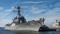 The Arleigh Burke-class guided-missile destroyer USS Gravely (DDG 107) returns to Naval Station Norfolk